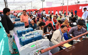Polling officials are collecting voting machines and other election materials at polling stations ahead of the first phase of voting for the Lok Sabha elections in Jaipur, Rajasthan, India, on April 18, 2024.