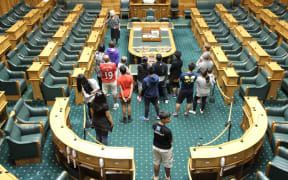 Parliament guide Diana Clear shows tourists around at one of the busiest times if year
