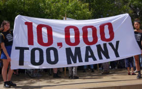 About 100 people attended the protest to mark New Zealand's prison population reaching 10,000.