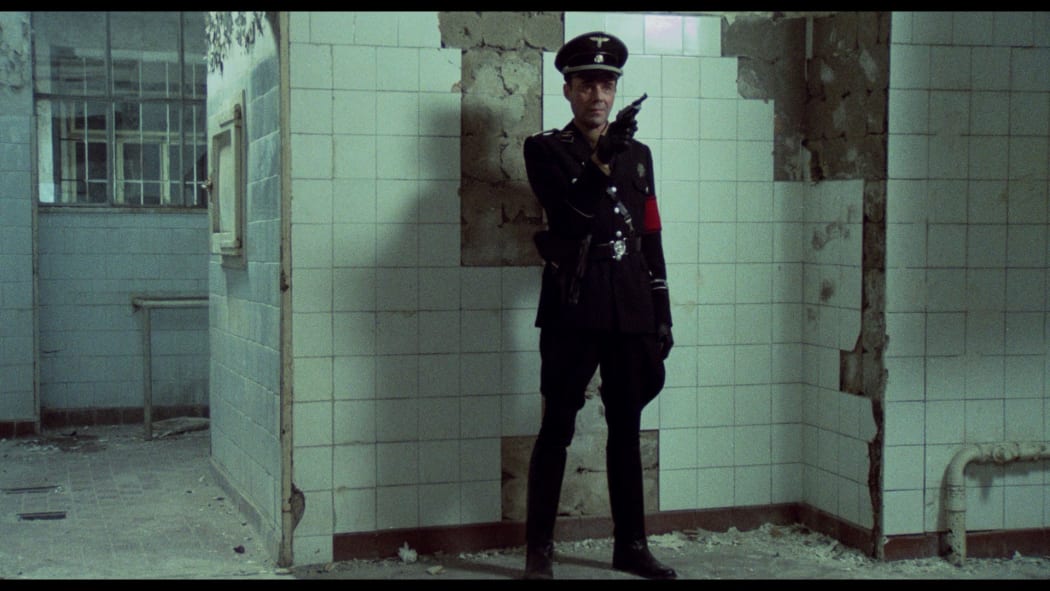 Dirk Bogarde looking sharp in The Night Porter (1974)