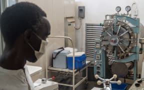 A doctor works in a Covid-19 laboratory at Mpilo Hospital in Bulawayo, Zimbabwe.
