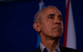 Former US President Barack Obama gives a speech at COP26 in Glasgow, Scotland.