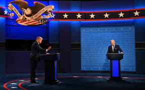 US President Donald Trump (L) and Democratic Presidential candidate and former US Vice President Joe Biden exchange arguments during the first presidential debate at the Case Western Reserve University and Cleveland Clinic in Cleveland, Ohio on September 29, 2020. (Photo by Jim WATSON / AFP)