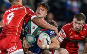Sam Healey of the Warriors tackled by Jeremy Marshall-King of the Dolphins, NZ Warriors v Dolphins.