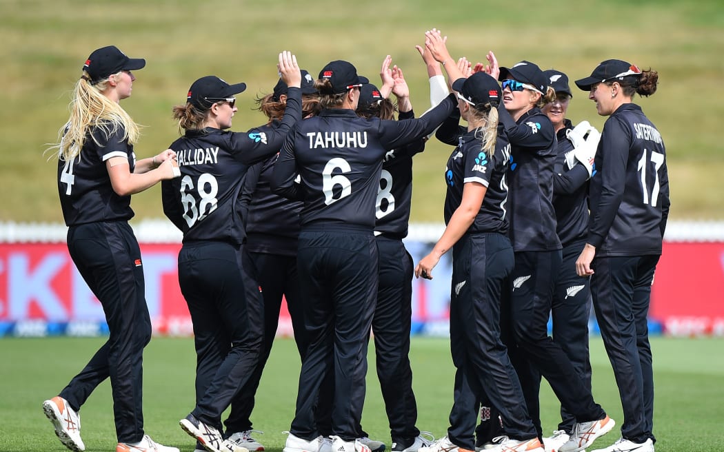 White Ferns celebrate an Indian wicket.