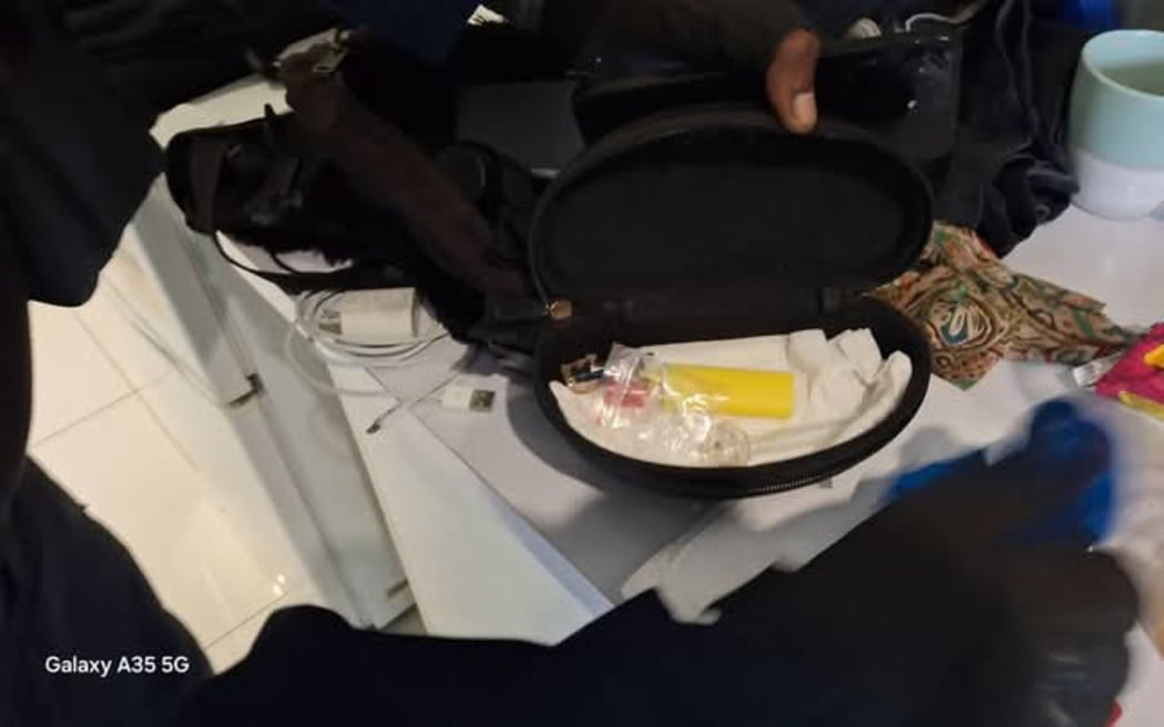 Two PNG police officers were taken into custody along with three other individuals after a raid on a Port Moresby hotel room on Saturday, where they were allegedly found possessing and consuming methamphetamine.