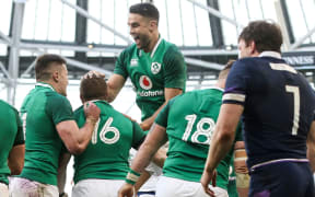 Ireland celebrate scoring against Scotland.