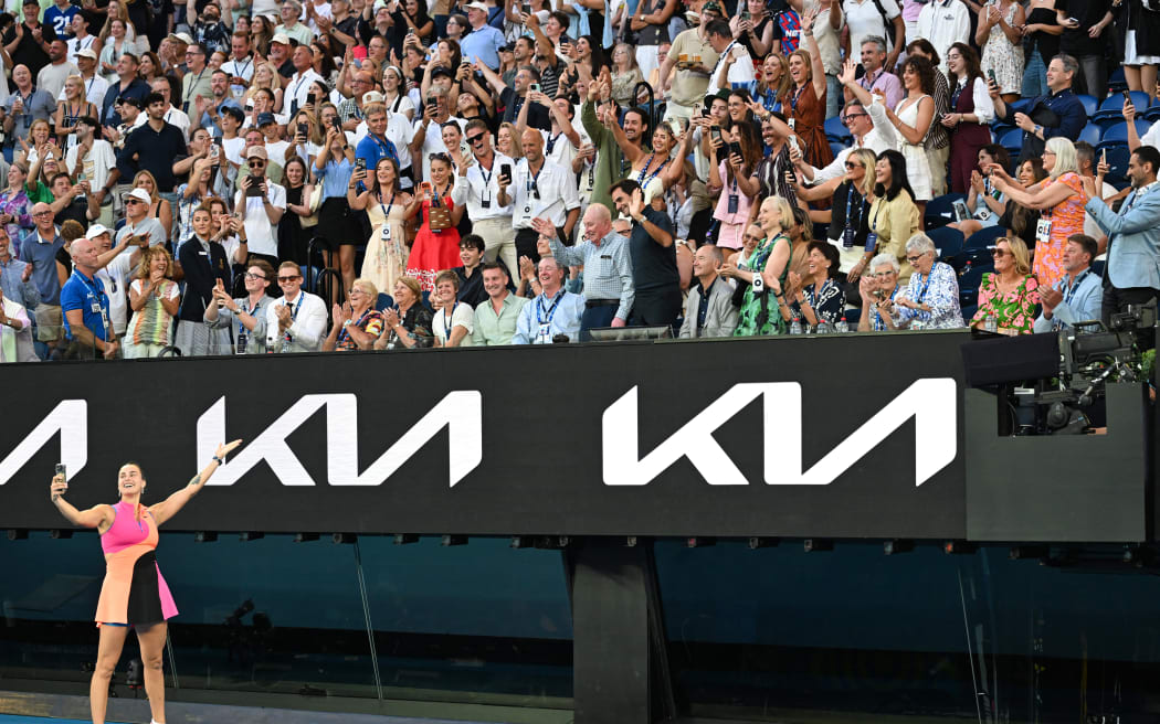 Belarus' Aryna Sabalenka takes a photo with the crowd at the Australian Open.