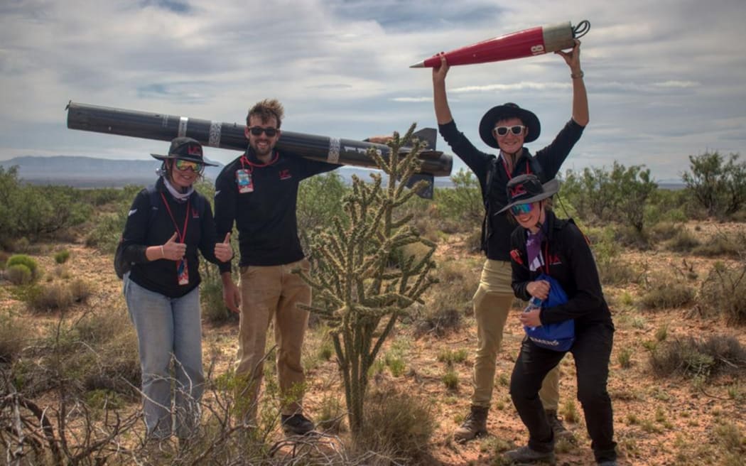 The winning UC Aerospace 2023 Spaceport America Cup team in New Mexico included, from left, Alicia Smith, Jack Davies, Reuben Van Dorp and Avalon Beker.