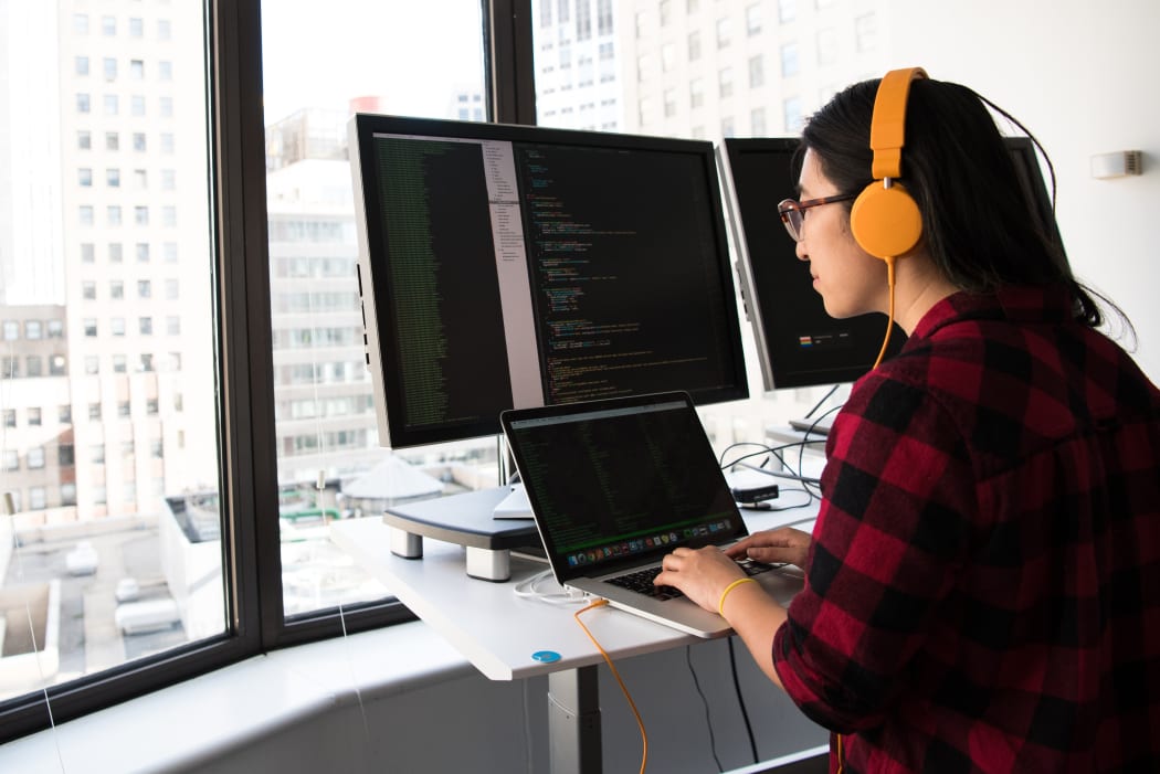 woman on desktop computer