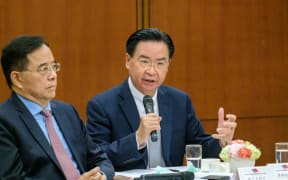Taiwan Foreign Minister Joseph Wu (R) seen talking to the media during the foreign press briefing in Taipei, Taiwan, 07 April 2021.