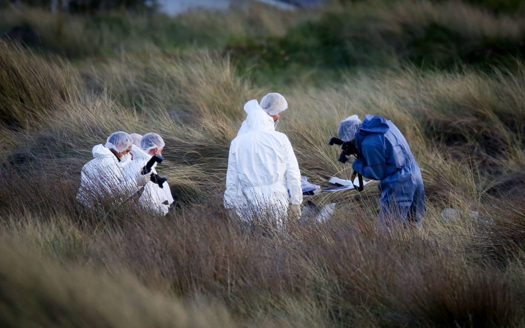 Police at the scene where Alex Fisher was found.