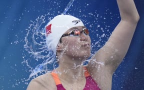 Fu Yuanhui of Zhejiang reacts prior to the women's 100m backstroke semi-final at the 2021 Chinese National Swimming Championships in Qingdao