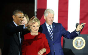 President Obama with the Clintons.