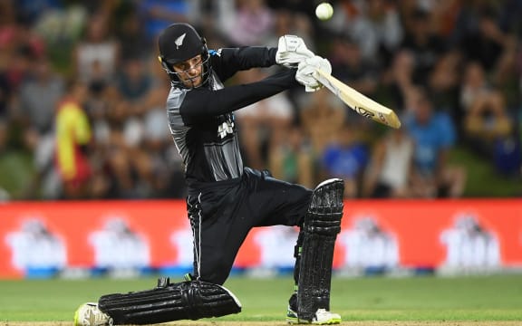 Tom Blundell hits hard through the off-side during a T20 for the Black Caps.