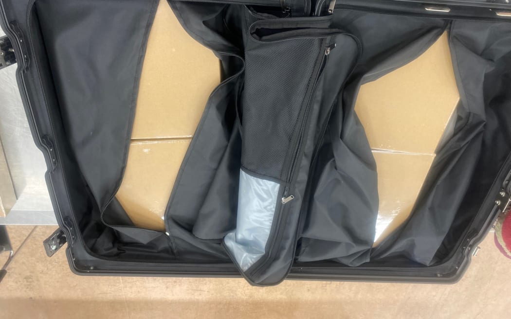 Cardboard boxes in a traveller's luggage found to contain methamphetamine.