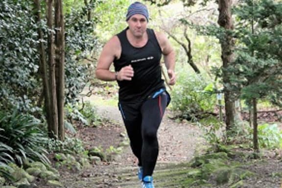 Andrew Dickson is a long-distance runner but also has a body mass index that puts him in the overweight or obese category.