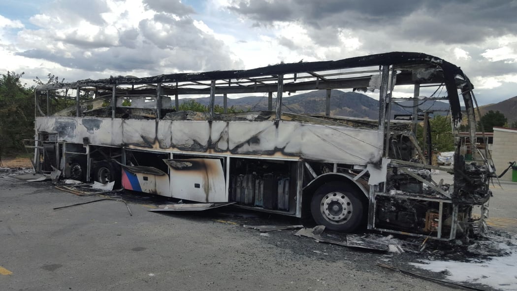 The bus that caught fire at the Mrs Jones fruit stall on the edge of Cromwell.
