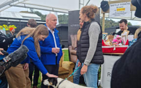 National Party candidate Emma Chatterton, with party leader Christopher Luxon at the 'Barket', next to the Farmers' Market in Upper Hutt.