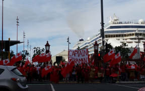 Tongan rugby league fans protest at Auckland's ferry terminal.