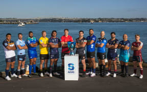 The team captains pose for a photograph with the trophy at the 2024 Super Rugby Pacific Season Launch.