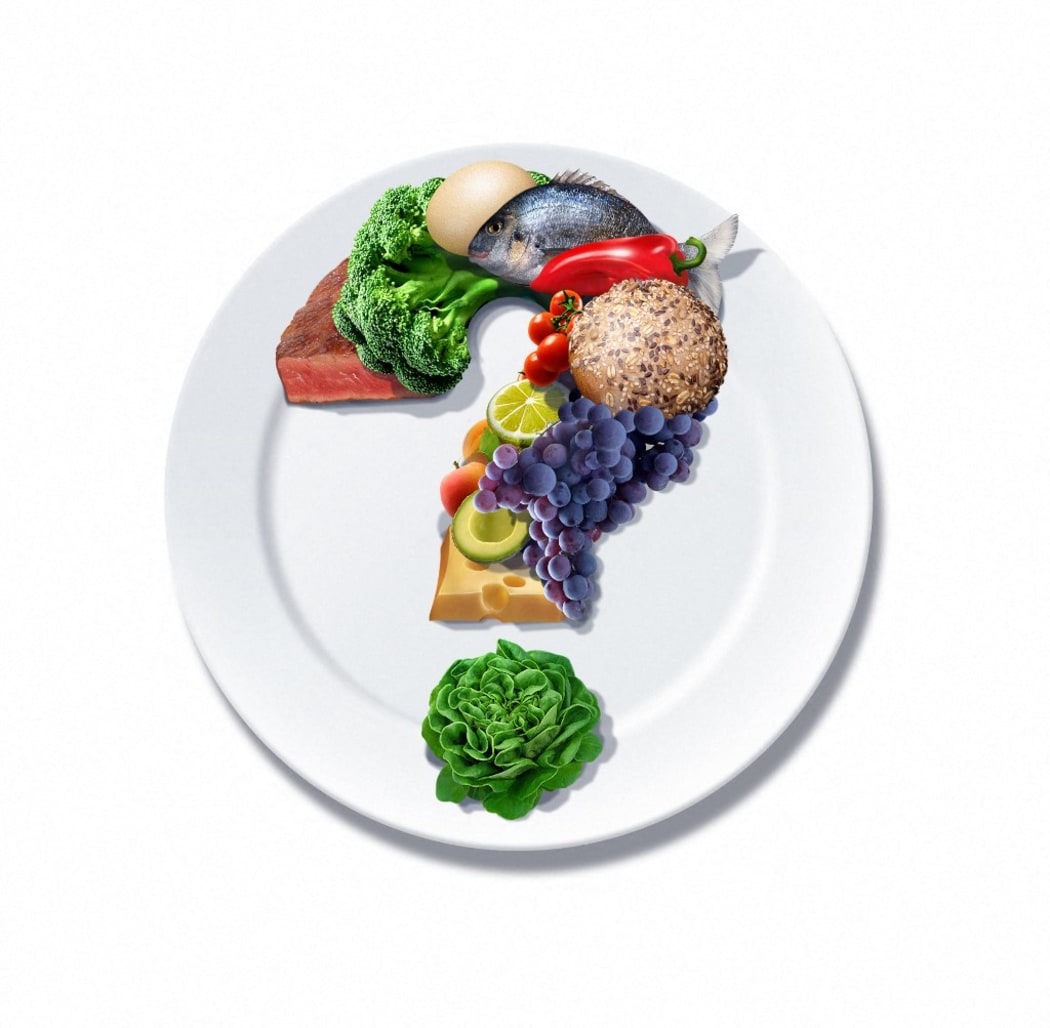Illustration, doubt about food (Photo by Wieslaw Smetek / Smetek / Photononstop via AFP)