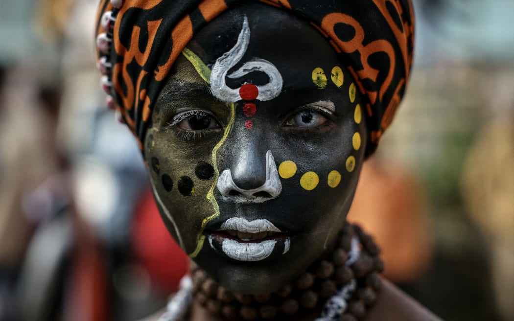 A Hindu devotee looks on as he takes part in a religious procession of Naya Udasin Akhara ahead of the Maha Kumbh Mela festival in Prayagraj on January 10, 2025. (Photo by Niharika KULKARNI / AFP)