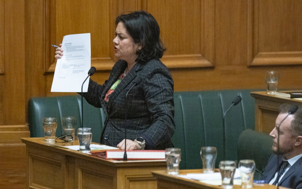 During Question Time, Labour's Health Spokesperson Dr Ayesha Verrall holds aloft a document, released under the OIA by Casey Costello, the existence of which Costello was reluctant to admit.