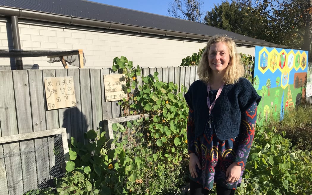 Bianca Woyak stands in the schools veggie patch.