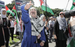 Protesters gathered at Parliament on 12 December to call for an immediate and permanent ceasefire in Gaza.