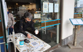 Oranna, one of the owners of Olafs Cafe in Mount Eden, isoverjoyed at being able to see customers again under level 3.