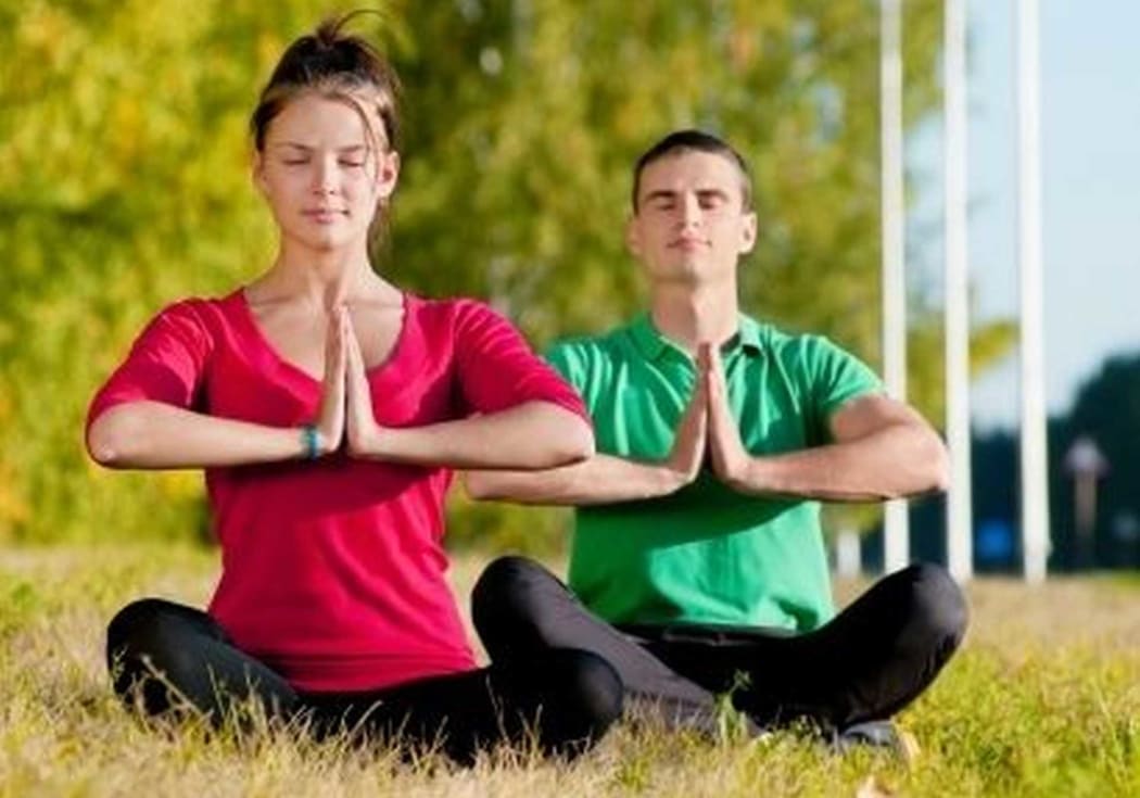 Couple doing yoga