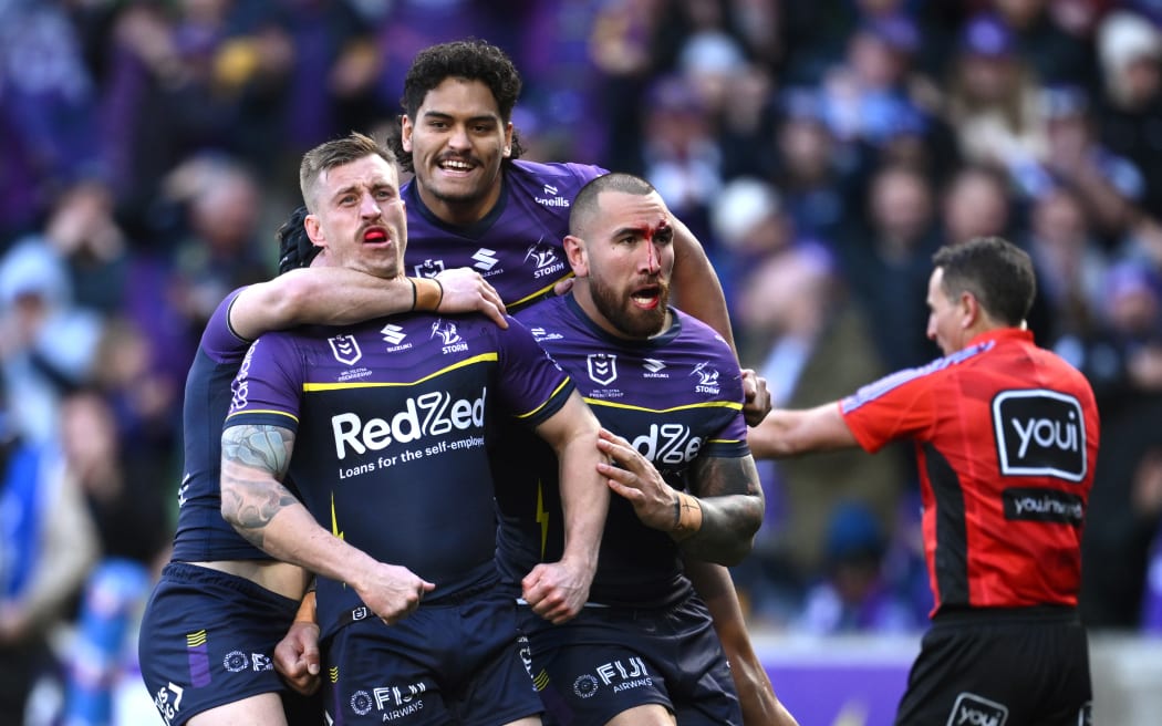 Cameron Munster celebrates scoring a try for the Melbourne Storm.