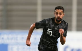 Sarpreet Singh playing for New Zealand.