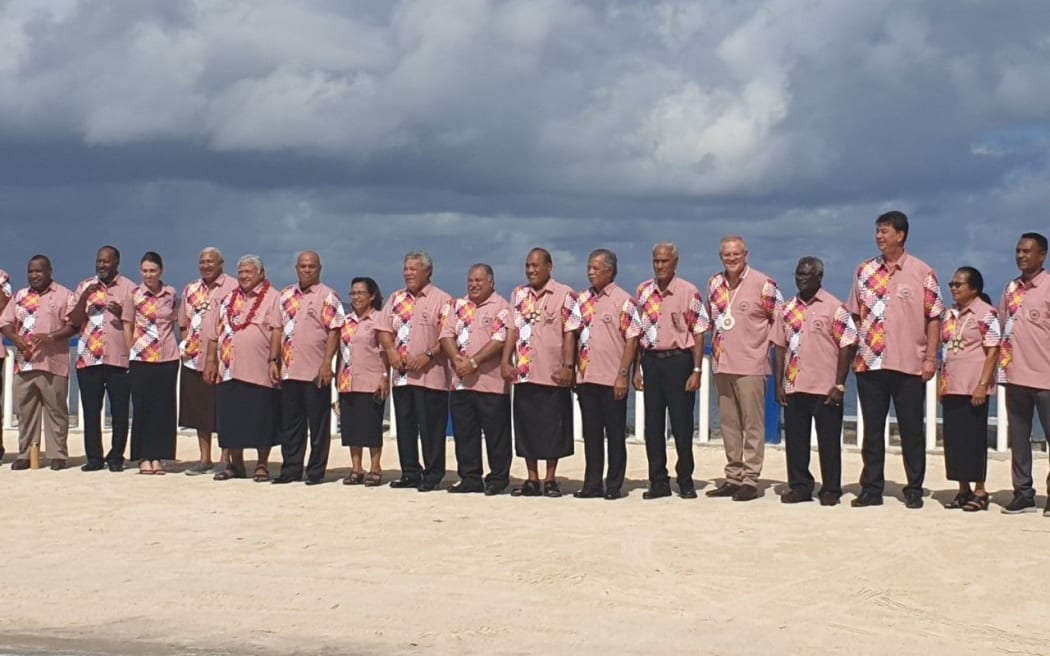 Leaders were all smiles as they posed in their matching coral shifts for the Pacific Islands Forum family photo at their summit in Tuvalu in 2019.