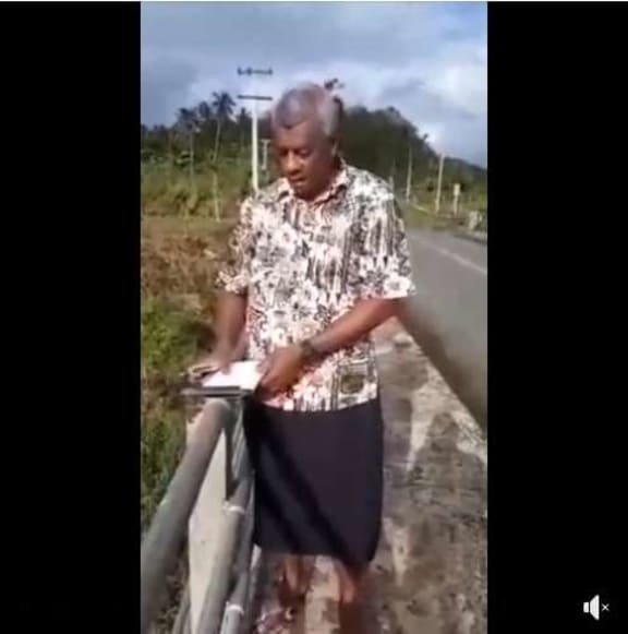 Pio Tikoduadua in the video posted to his Facebook page, from the bridge where the assault took place.