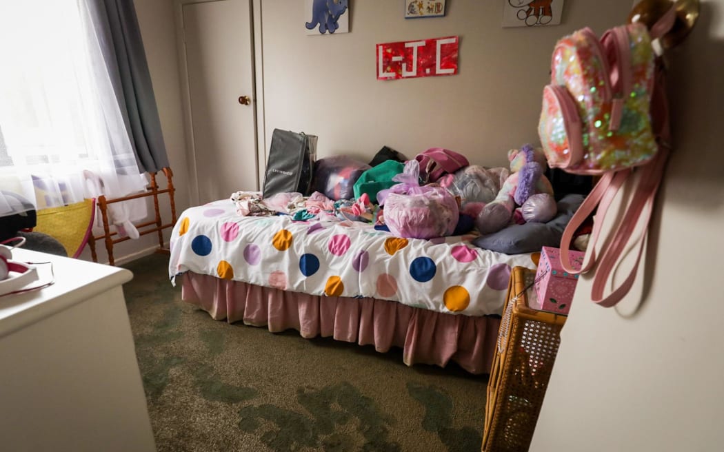 a child's bedroom flooded with mud in Gisborne