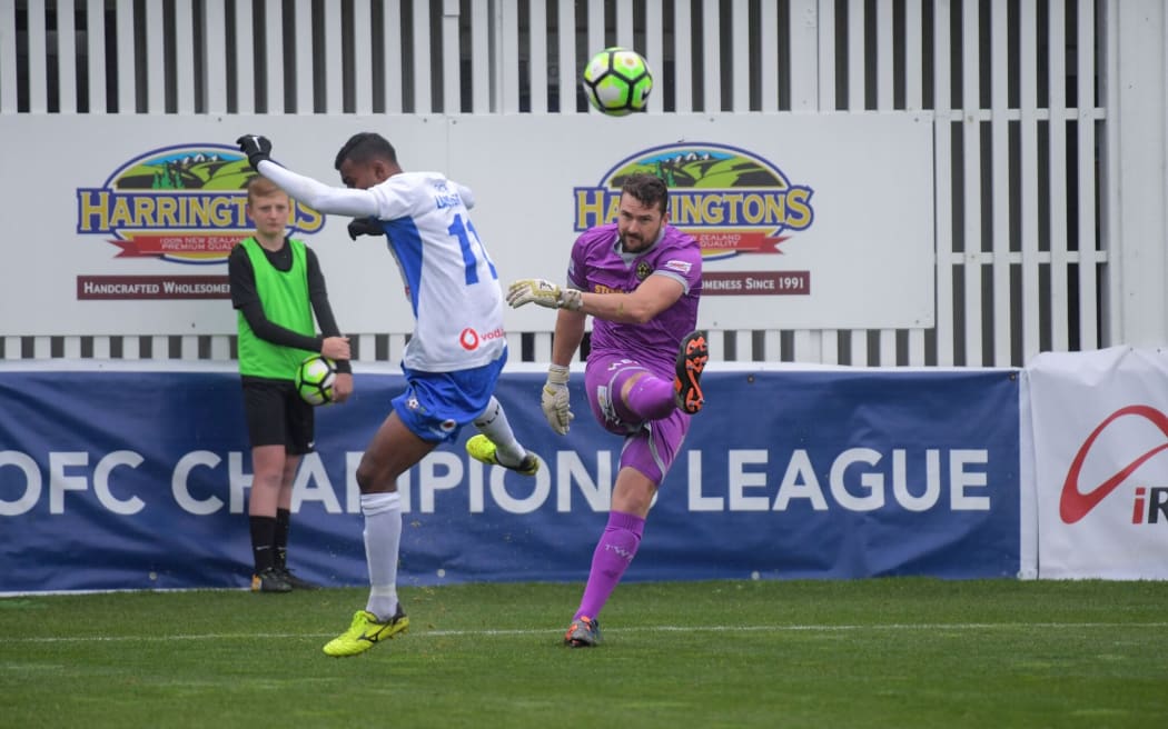 Team Wellington goalkeeper Scott Basalaj clears the ball in the first leg vs Lautoka.