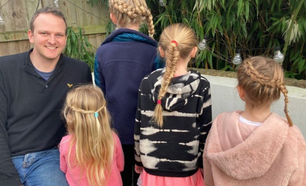 John Hardern with his four daughters