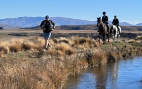 Runners and riders test out the Only Fools and Horses course ahead of the race on Saturday in the Maniototo.