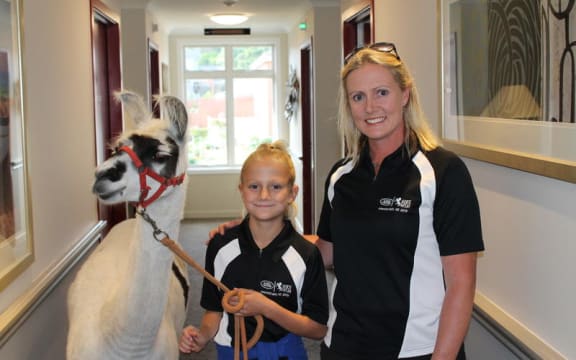 Fleur Cutfield, owner of Little Bo Peeps mobile farm, with her daughter Madison