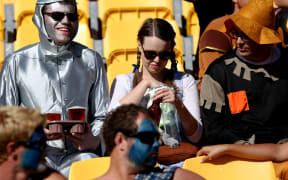 Fans take a moment in the stands.