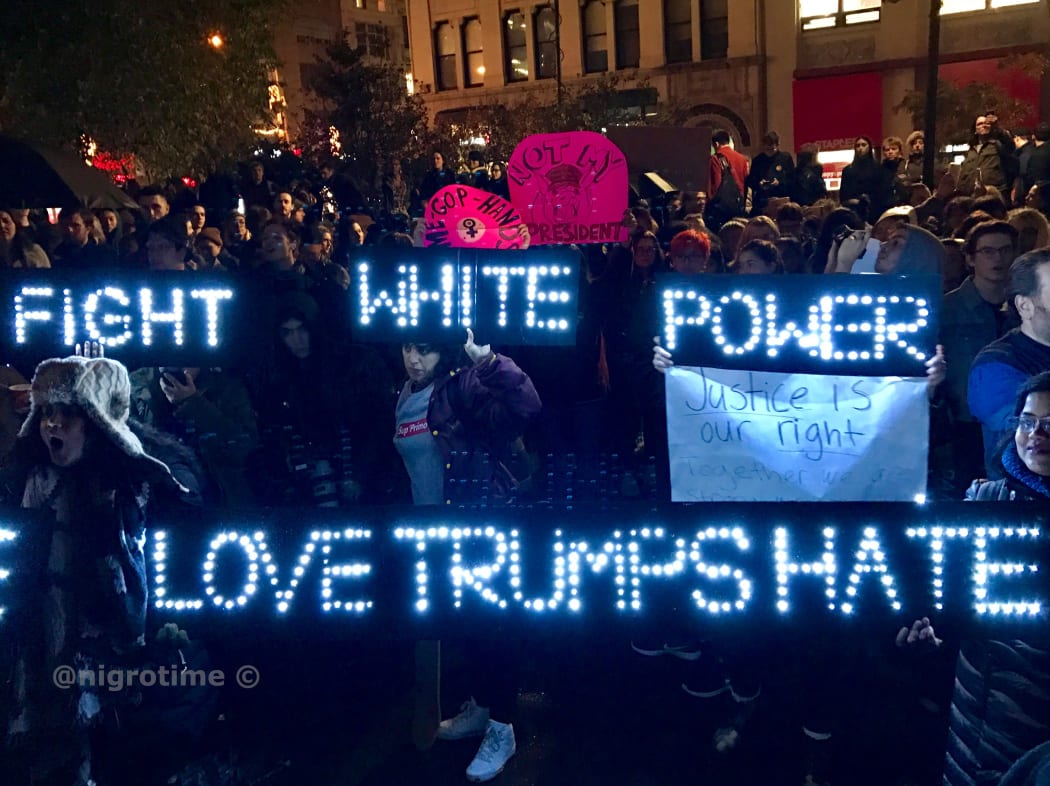 Anti-Trump protesters in Union Square, New York, on Wednesday night. #NotMyPresident has been shared on Twitter thousands of times.