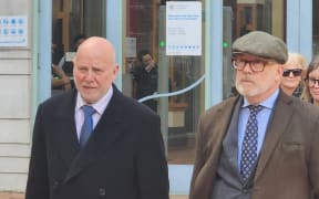 Dr Philip Polkinghorne and his lawyer Ron Mansfield KC leaving court at the end of week 8 of the trial