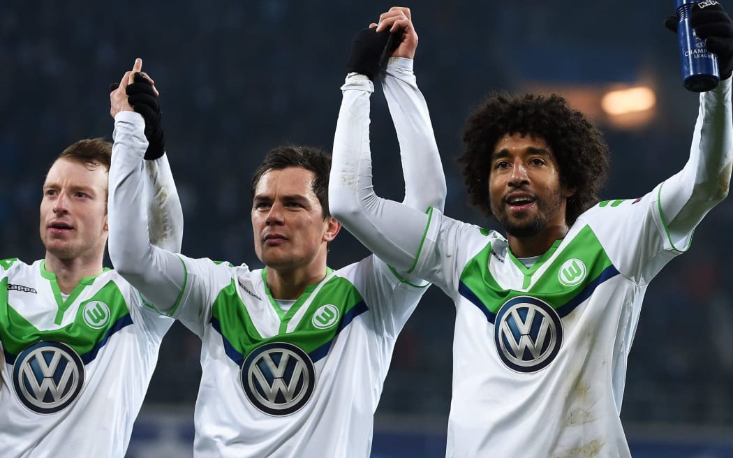Wolfsburg players celebrate.