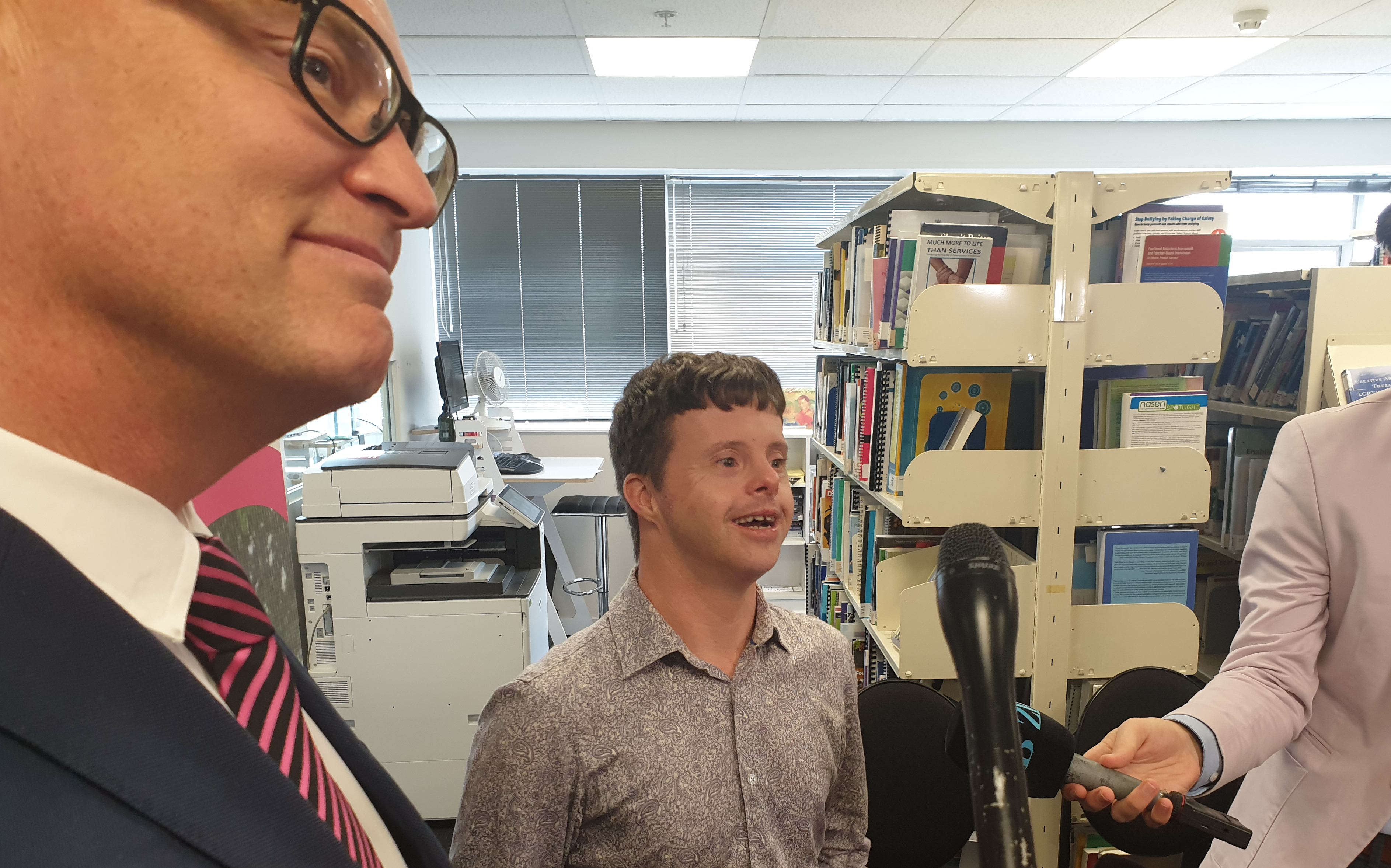 Tim Fairhill answers questions with Minister David Clark.