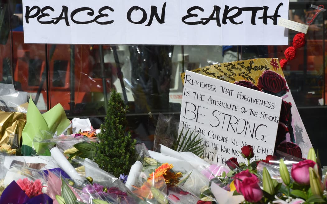 A memorial with  flowers and other mementoes continues to grow in Martin Place near the cafe where the siege took place.