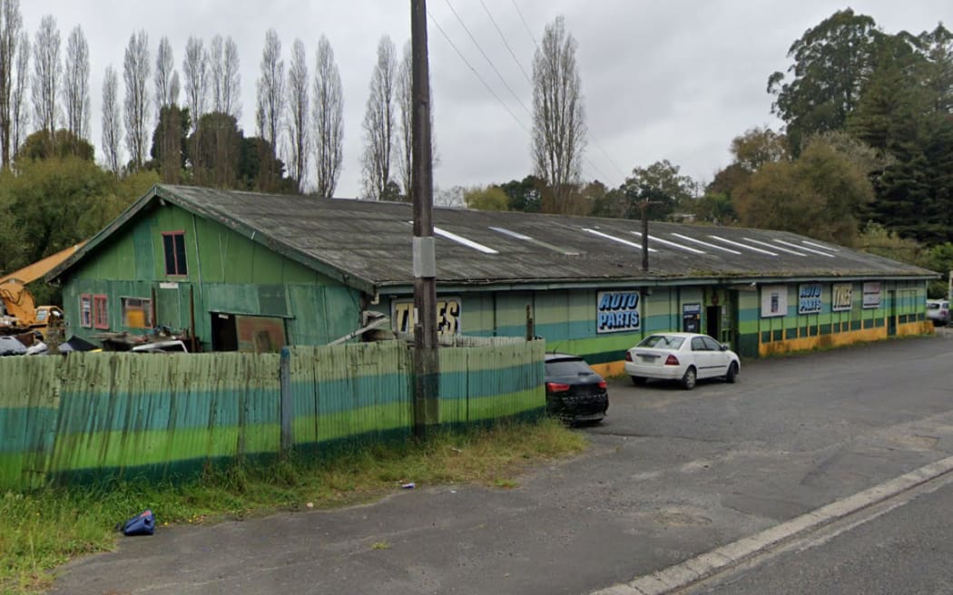An old looking car wreckers yard on the side of a State Highway which was searched by police during the investigation into John Mills disappearence.