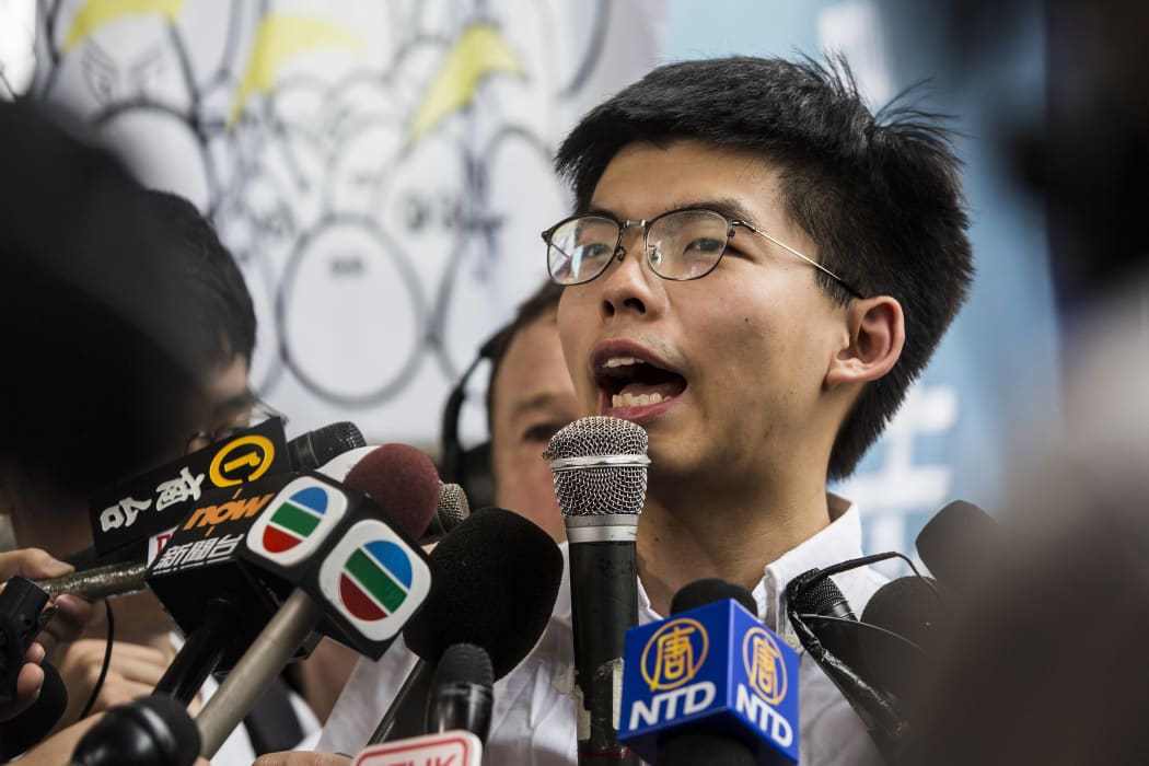 Hong Kong democracy activist Joshua Wong speaks to the media after leaving Lai Chi Kok Correctional Institute in Hong Kong on June 17, 2019.