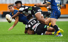 Michael Collins offloads in Hawke's Bay's Ranfurly Shield challenge against Otago.